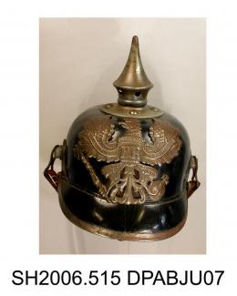 Helmet, men's, military, German Army helmet World War I, pickelhaube, black lacquered leather, peaked front and back, front peak trimmed white metal strip, spiked crown, metal helmet plate attached to front with spread eagle motif and FR in centre, mott