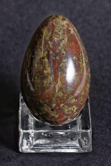 Rock, serpentine, specimen of red and green serpentine polished to egg-shape