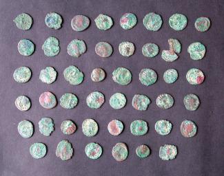 Coin hoard, 46 coins found in 1875 at Blackmoor, Selborne, Hampshire in the base of a coarse grey-ware pot, probably deposited soon after Aurelian's coinage reform in 271