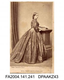 Photograph, Mrs Harriett Lutman of Cahir, standing leaning on a plinth, taken by James Simonton of Dublinvol 1, page 30 - Witnesses for the Defendants