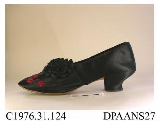 Shoe, one only, women's, black satin, vamp trimmed with embroidered red roses and scrolling silver foliage, silver now tarnished, rounded toe, two decorative linked bands across throat of vamp of black satin bows with dark red ribbon and tarnished silve