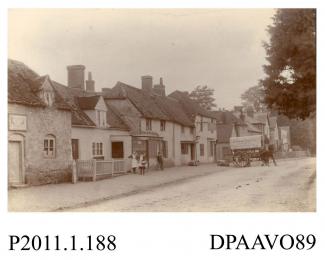 Photograph, black and white, showing The White Hart Inn, with a horse and wagon for Crowleys Brewery, London Road, Holybourne, Alton, Hampshire, 1890