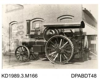 Photograph, black and white, showing a with a steam engine, for Fowler, built by Tasker and Co, Waterloo Foundry, Anna Valley, Abbotts Ann, Hampshire