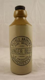 Stoneware ginger beer bottle for Wilfred Andrews of Winchester and Andover. The bottle has a screw stopper but it is from a Welsh & Co. bottle.