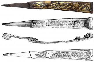 Roman military scabbard slide from context 26, Trench V, Victoria Road, Winchester. Inlaid with brass vine scroll motifs.