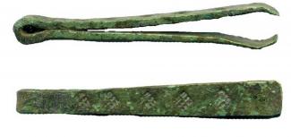 Copper alloy tweezers. Also 635.7 decorated with punch marks. From VR72-80, Victoria Road, Winchester, Hampshire. Excavated by Winchester Archaeology Section, 1972-1980.