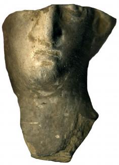 Ceramic figurine of Venus- fragment from face. From VR72-80, Victoria Road, Winchester, Hampshire. Excavated by Winchester Archaeology Section, 1972-1980.
