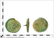 An incomplete cast gilded copper alloy Anglo Saxon saucer brooch.